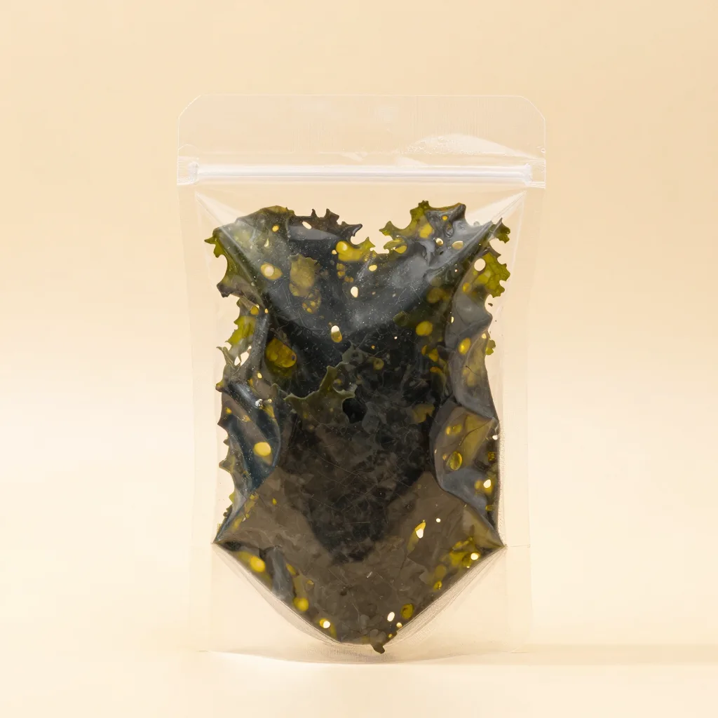 A pouch of dried sea moss on a light background